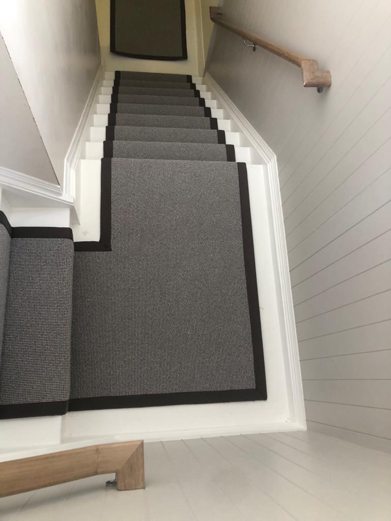 grey carpet with dark trim